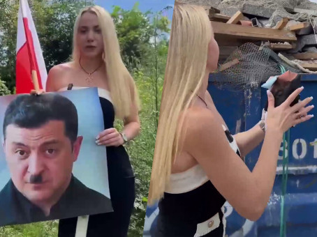 Кандидат в мэры Кракова выбросила на помойку портрет Зеленского в образе Гитлера